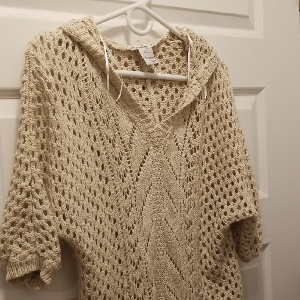 Hooded v- neck poncho with fringe bottom
